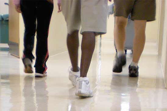 cleaners walking down the hallway